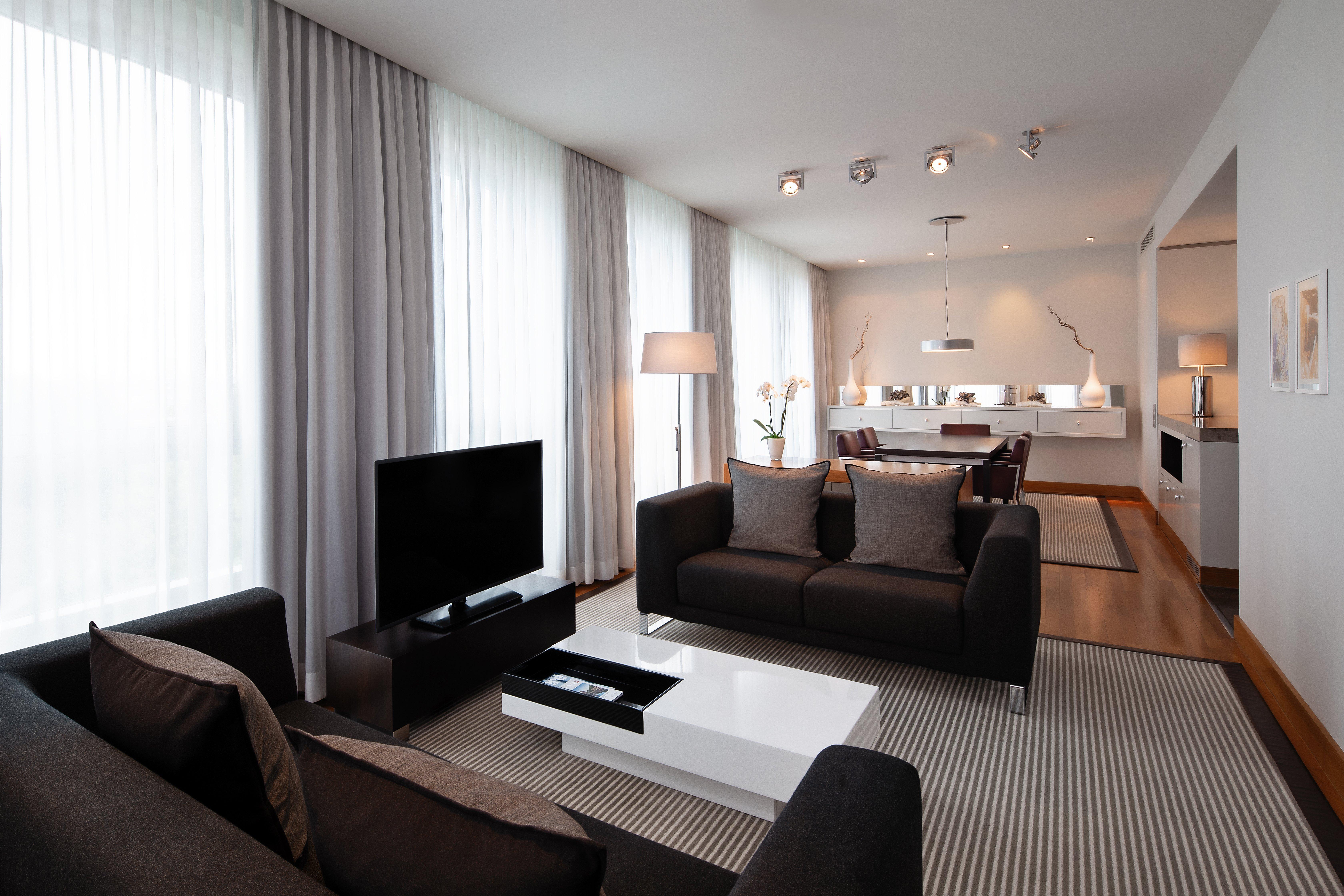 Hotel Intercontinental Berlin By Ihg Esterno foto A living room in a serviced apartment in Berlin, Germany